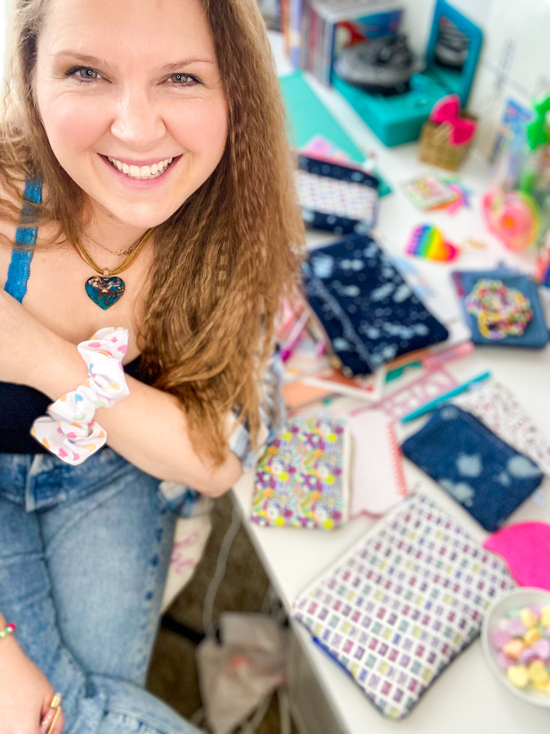 Christina with her 90's inspired bag collection