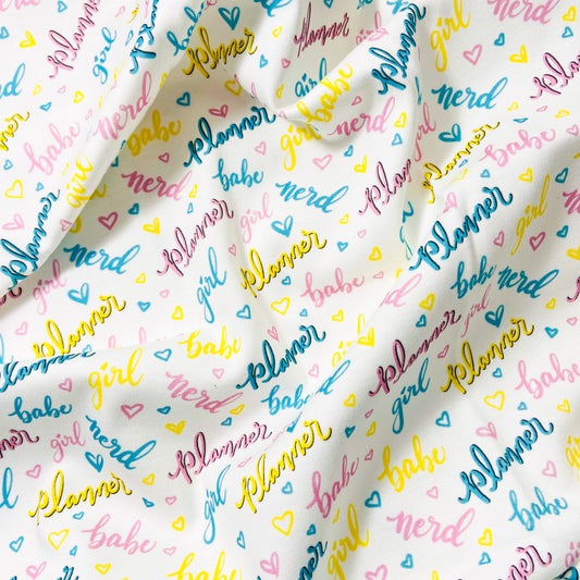 My First Fabric Design- "Planner Girl, Babe Nerd" in pink, teal and bright yellow.