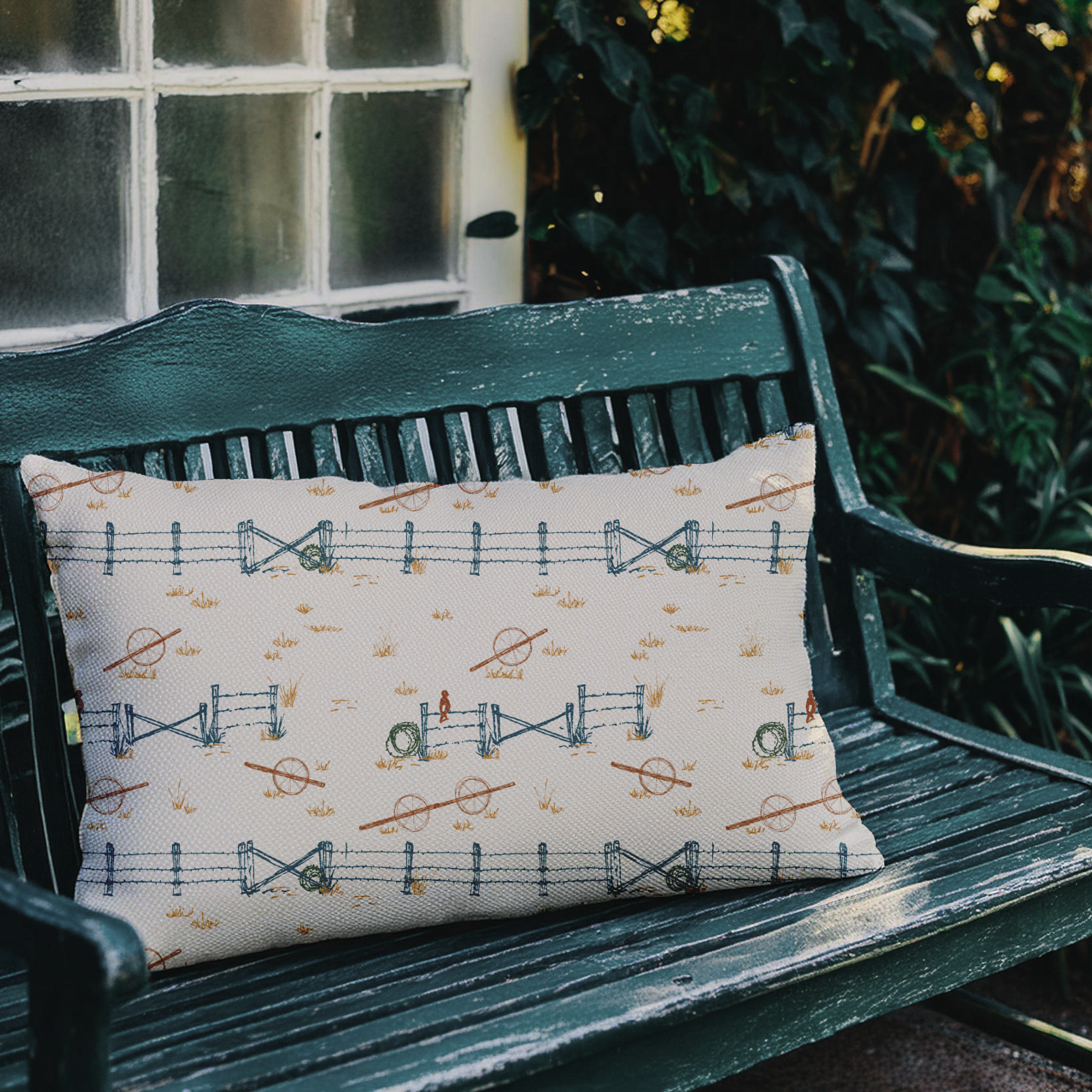 Pillow on bench with a fences and wheel lines farm pattern license artwork by Christina jean designs